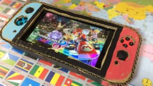 Un jeune garçon fabrique une Switch en carton, son papa lui fait un cadeau surprise énorme !